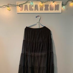Long black mesh skirt with lace details